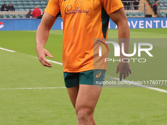 Australia's Joseph-Aukuso Suaalii (The Kings School) makes his debut before kickoff without boots during the Autumn Nations Series between E...