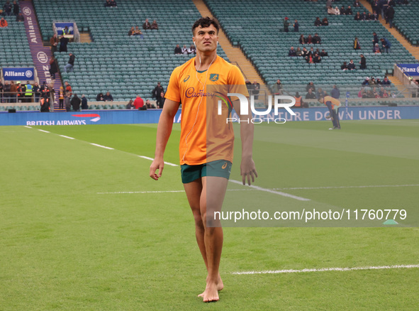 Australia's Joseph-Aukuso Suaalii (The Kings School) makes his debut before kickoff without boots during the Autumn Nations Series between E...