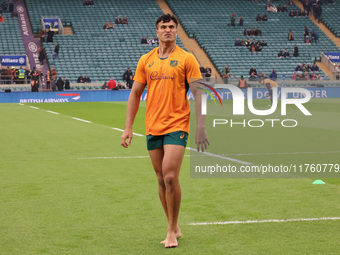 Australia's Joseph-Aukuso Suaalii (The Kings School) makes his debut before kickoff without boots during the Autumn Nations Series between E...