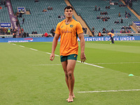 Australia's Joseph-Aukuso Suaalii (The Kings School) makes his debut before kickoff without boots during the Autumn Nations Series between E...