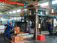 A worker of Yangfan Copper (Anhui) Co LTD works on a production line at the Yuexi County Economic Development Zone in Anqing, China, on Nove...