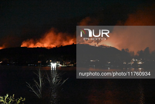 A wildfire is seen on a mountain in West Milford, New Jersey, United States, on November 9, 2024. Firefighters and emergency responders batt...