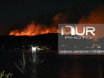 A wildfire is seen on a mountain in West Milford, New Jersey, United States, on November 9, 2024. Firefighters and emergency responders batt...