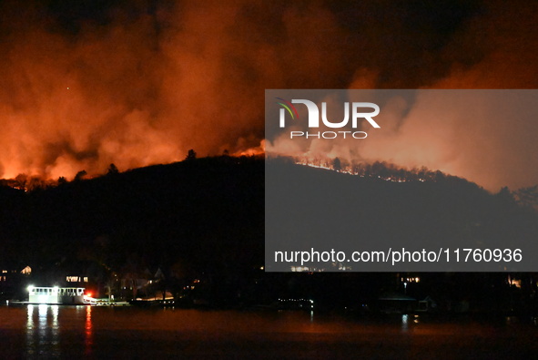 A wildfire is seen on a mountain in West Milford, New Jersey, United States, on November 9, 2024. Firefighters and emergency responders batt...