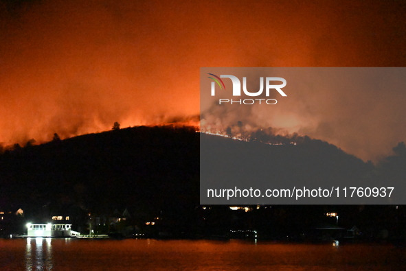 A wildfire is seen on a mountain in West Milford, New Jersey, United States, on November 9, 2024. Firefighters and emergency responders batt...