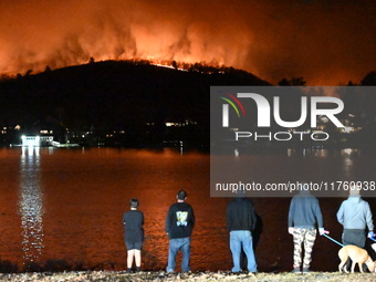 A wildfire is seen on a mountain in West Milford, New Jersey, United States, on November 9, 2024. Firefighters and emergency responders batt...