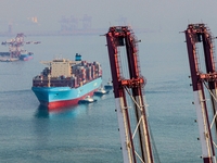 The Maersk Halifax, on the Central and South America route, berths at the Qianwan Container Terminal of Qingdao Port in Qingdao, Shandong Pr...