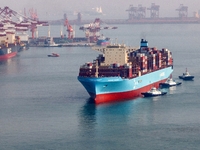 The Maersk Halifax, on the Central and South America route, berths at the Qianwan Container Terminal of Qingdao Port in Qingdao, Shandong Pr...