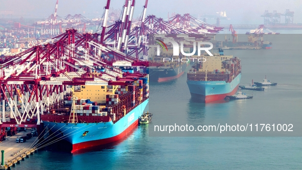 The Maersk Halifax, on the Central and South America route, berths at the Qianwan Container Terminal of Qingdao Port in Qingdao, Shandong Pr...