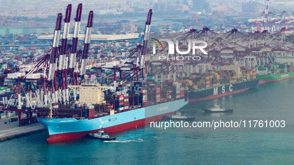 The Maersk Halifax, on the Central and South America route, berths at the Qianwan Container Terminal of Qingdao Port in Qingdao, Shandong Pr...