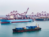 The Maersk Halifax, on the Central and South America route, berths at the Qianwan Container Terminal of Qingdao Port in Qingdao, Shandong Pr...