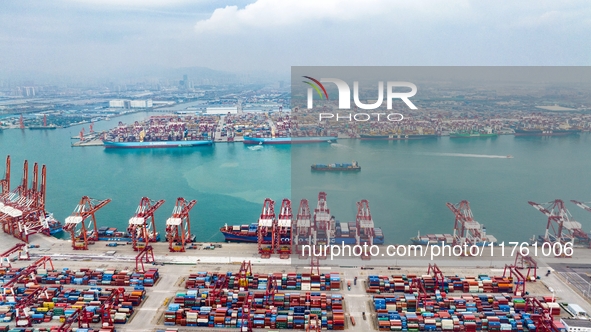 The Maersk Halifax, on the Central and South America route, berths at the Qianwan Container Terminal of Qingdao Port in Qingdao, Shandong Pr...