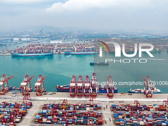 The Maersk Halifax, on the Central and South America route, berths at the Qianwan Container Terminal of Qingdao Port in Qingdao, Shandong Pr...