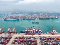 The Maersk Halifax, on the Central and South America route, berths at the Qianwan Container Terminal of Qingdao Port in Qingdao, Shandong Pr...