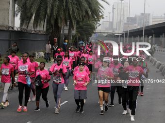 Women participate in the ninth edition of the Lagos Women Run 2024, a 10km female road race, tagged ''More Than a Run,'' held at Onikan in L...