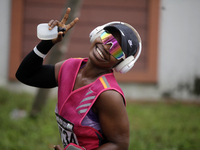 A woman shows excitement during the ninth edition of the Lagos Women Run 2024, a 10km female road race, tagged ''More Than a Run,'' held at...