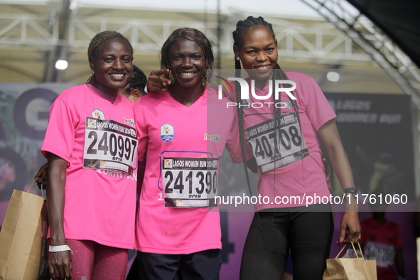 From left to right: Liliane Nguetsa of Cameroon, second place at the Lagos Women Run 2024, with a time of 40:02:54; Joy Abiye David, the cha...