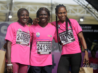 From left to right: Liliane Nguetsa of Cameroon, second place at the Lagos Women Run 2024, with a time of 40:02:54; Joy Abiye David, the cha...