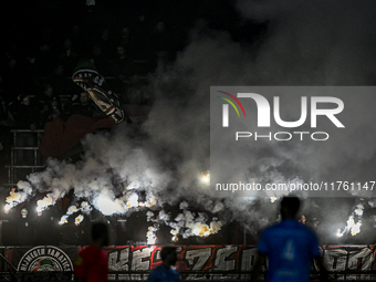 Fans of NEC with fireworks during the match RKC - NEC at the Mandemakers Stadium for the season 2024-2025 in Waalwijk, Netherlands, on Novem...