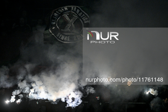 Fans of NEC with fireworks during the match RKC - NEC at the Mandemakers Stadium for the season 2024-2025 in Waalwijk, Netherlands, on Novem...