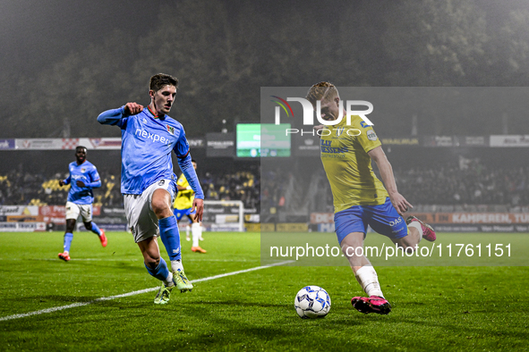 NEC midfielder Mees Hoedemakers and RKC midfielder Richard van der Venne play during the match RKC vs. NEC at the Mandemakers Stadium in Waa...