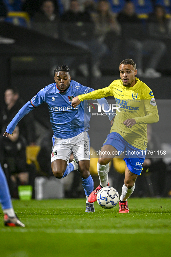 NEC forward Sontje Hansen and RKC defender Liam van Gelderen play during the match RKC - NEC at the Mandemakers Stadium for the 2024-2025 se...