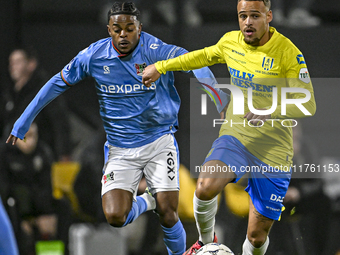 NEC forward Sontje Hansen and RKC defender Liam van Gelderen play during the match RKC - NEC at the Mandemakers Stadium for the 2024-2025 se...