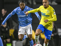 NEC forward Sontje Hansen and RKC defender Liam van Gelderen play during the match RKC - NEC at the Mandemakers Stadium for the 2024-2025 se...