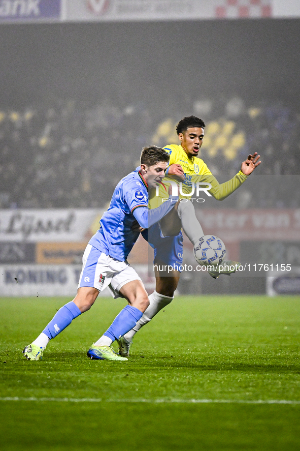 NEC midfielder Mees Hoedemakers and RKC midfielder Daouda Weidmann play during the match RKC vs. NEC at the Mandemakers Stadium in Waalwijk,...