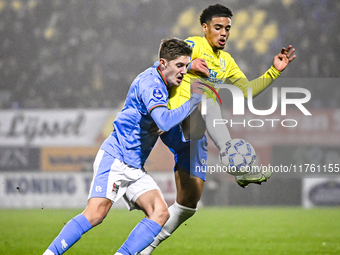 NEC midfielder Mees Hoedemakers and RKC midfielder Daouda Weidmann play during the match RKC vs. NEC at the Mandemakers Stadium in Waalwijk,...