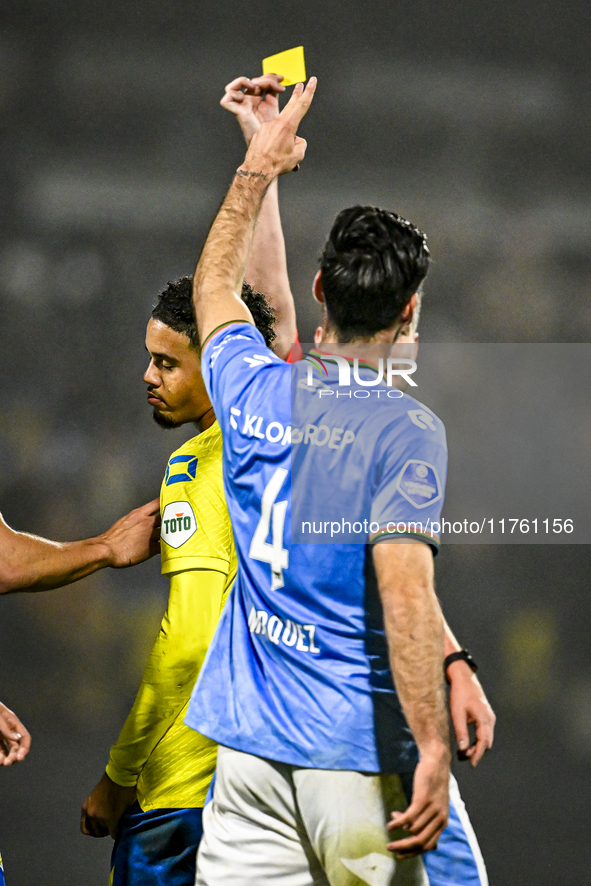 Referee Erwin Blank shows the second yellow card to RKC midfielder Daouda Weidmann during the match between RKC and NEC at the Mandemakers S...