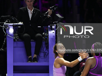 RIYADH, SAUDI ARABIA - NOVEMBER 09: Quinwen Zheng of China congratulates Coco Gauff of USA after she wins the Final match, on Day 8 of the 2...