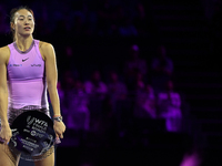 RIYADH, SAUDI ARABIA - NOVEMBER 09: Qinwen Zheng of China holds the runner-up trophy after losing to Coco Gauff of the United States in the...