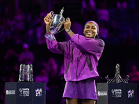 RIYADH, SAUDI ARABIA - NOVEMBER 09: Coco Gauff of the United States poses with the Billie Jean King Trophy after defeating Qinwen Zheng of C...