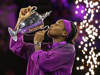 RIYADH, SAUDI ARABIA - NOVEMBER 09: Coco Gauff of the United States poses with the Billie Jean King Trophy after defeating Qinwen Zheng of C...