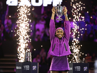 RIYADH, SAUDI ARABIA - NOVEMBER 09: Coco Gauff of the United States poses with the Billie Jean King Trophy after defeating Qinwen Zheng of C...