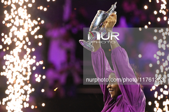 RIYADH, SAUDI ARABIA - NOVEMBER 09: Coco Gauff of the United States poses with the Billie Jean King Trophy after defeating Qinwen Zheng of C...