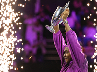 RIYADH, SAUDI ARABIA - NOVEMBER 09: Coco Gauff of the United States poses with the Billie Jean King Trophy after defeating Qinwen Zheng of C...