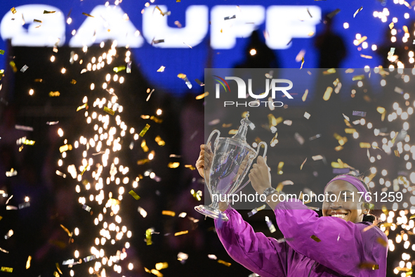 RIYADH, SAUDI ARABIA - NOVEMBER 09: Coco Gauff of the United States poses with the Billie Jean King Trophy after defeating Qinwen Zheng of C...