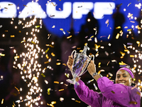 RIYADH, SAUDI ARABIA - NOVEMBER 09: Coco Gauff of the United States poses with the Billie Jean King Trophy after defeating Qinwen Zheng of C...