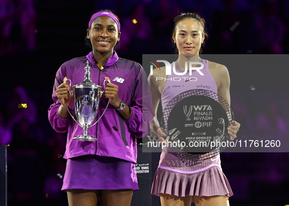 RIYADH, SAUDI ARABIA - NOVEMBER 09: Coco Gauff of the United States and Qinwen Zheng of China pose at the Awards Ceremony during the Singles...