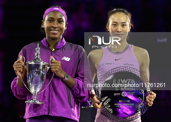 RIYADH, SAUDI ARABIA - NOVEMBER 09: Coco Gauff of the United States and Qinwen Zheng of China pose at the Awards Ceremony during the Singles...