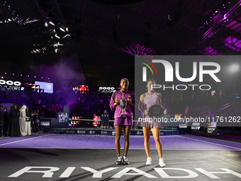 RIYADH, SAUDI ARABIA - NOVEMBER 09: Coco Gauff of the United States and Qinwen Zheng of China pose at the Awards Ceremony during the Singles...