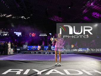 RIYADH, SAUDI ARABIA - NOVEMBER 09: Coco Gauff of the United States poses with the Billie Jean King Trophy after defeating Qinwen Zheng of C...