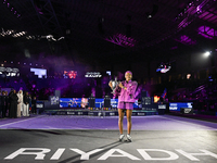 RIYADH, SAUDI ARABIA - NOVEMBER 09: Coco Gauff of the United States poses with the Billie Jean King Trophy after defeating Qinwen Zheng of C...