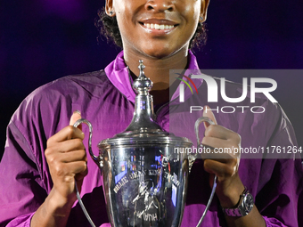 RIYADH, SAUDI ARABIA - NOVEMBER 09: Coco Gauff of the United States poses with the Billie Jean King Trophy after defeating Qinwen Zheng of C...