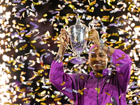 RIYADH, SAUDI ARABIA - NOVEMBER 09: Coco Gauff of the United States poses with the Billie Jean King Trophy after defeating Qinwen Zheng of C...