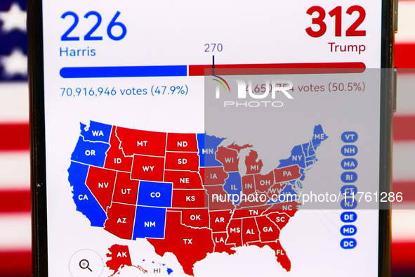 Google graphic with the final US presidential results is screened on a mobile phone for illustration photo on November 10th, 2024 in Berlin,...