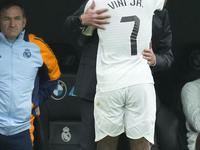 Vinicius Junior left winger of Real Madrid and Brazil celebrates after scoring his sides first goal with Carlo Ancelotti head coach of Real...