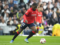 Enzo Boyomo centre-back of Osasuna and Cameroon during the La Liga match between Real Madrid CF and CA Osasuna at Estadio Santiago Bernabeu...